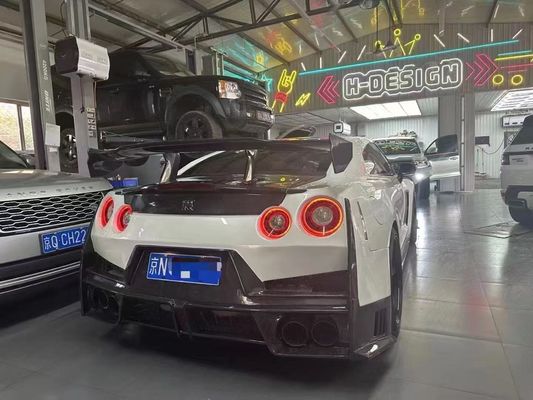 นิสสัน GTR คาร์บอนไฟเบอร์ คอร์ดี้ คิต GTR r35 ปรับปรุง 2024nismo สไตล์หน้าและหลัง สปอยเลอร์รถชนกัน