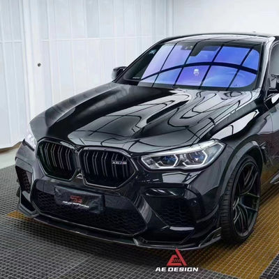 สําหรับ BMW X6M F96 คาร์บอนไฟเบอร์ คอร์ดี้คิต X6M F96 อัพเกรด AE Style คาร์บอนไฟเบอร์หน้าลิปดีฟิวเซอร์ สปอยเลอร์