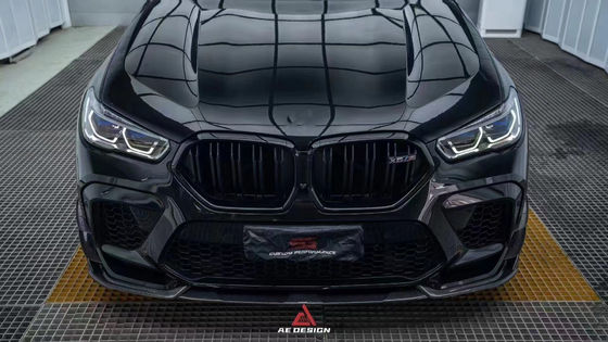สําหรับ BMW X6M F96 คาร์บอนไฟเบอร์ คอร์ดี้คิต X6M F96 อัพเกรด AE Style คาร์บอนไฟเบอร์หน้าลิปดีฟิวเซอร์ สปอยเลอร์