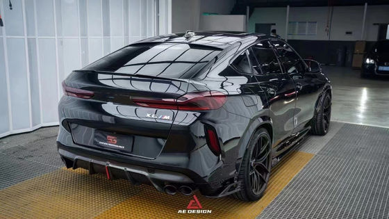 สําหรับ BMW X6M F96 คาร์บอนไฟเบอร์ คอร์ดี้คิต X6M F96 อัพเกรด AE Style คาร์บอนไฟเบอร์หน้าลิปดีฟิวเซอร์ สปอยเลอร์