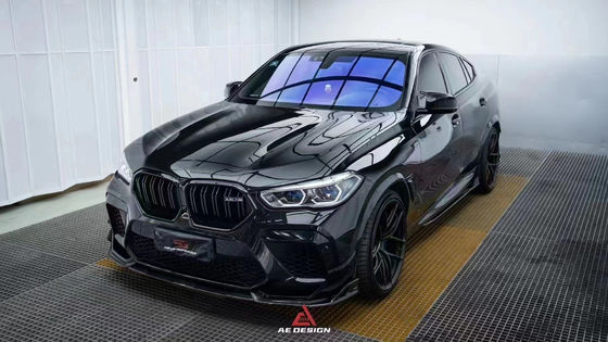 สําหรับ BMW X6M F96 คาร์บอนไฟเบอร์ คอร์ดี้คิต X6M F96 อัพเกรด AE Style คาร์บอนไฟเบอร์หน้าลิปดีฟิวเซอร์ สปอยเลอร์