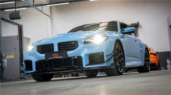 สําหรับ BMW M2 G87 คาร์บอนไฟเบอร์ คอร์ดี้คิต M2 G87 อัพเกรด AE Style คาร์บอนไฟเบอร์ ฟอร์ท ลิป ดีฟิวเซอร์ สปอยเลอร์ คอร์ดี้คิต